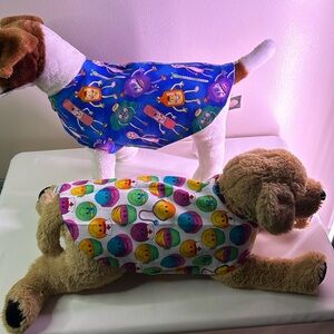 Reversible Apparel for Dogs in Multicolor Smiley Faces and Get-Well Faces.